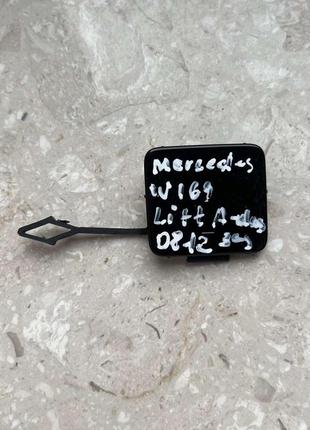 Заглушка буксирувального гака mercedes w169 a-klass 08-12p. рестайл зад а1698853322