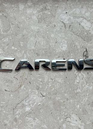 Емблема задньої кляпи kia carens