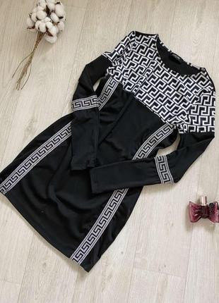 Стильное мини платье черного цвета с серебристыми вставками платье с длинными рукавами р.м8 фото