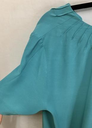 Голубая блуза с v-образным вырезом с короткими рукавами7 фото