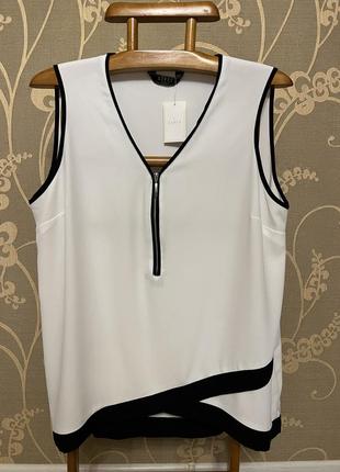 Дуже красива та стильна брендова блузка.