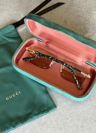 Сонцезахисні окуляри gucci gg1221s5 фото