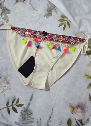 Низ купальника, плавки з китичками