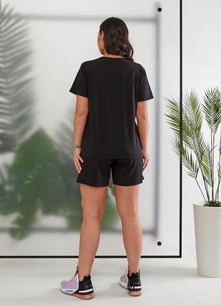 Жіночий якісний спортивний літній чорний костюм в стилі найк футболка і шорти бавовна3 фото