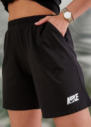 Жіночий якісний спортивний літній чорний костюм в стилі найк футболка і шорти бавовна5 фото