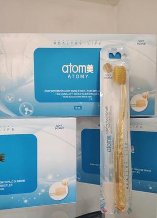 Зубна щітка атомі atomy