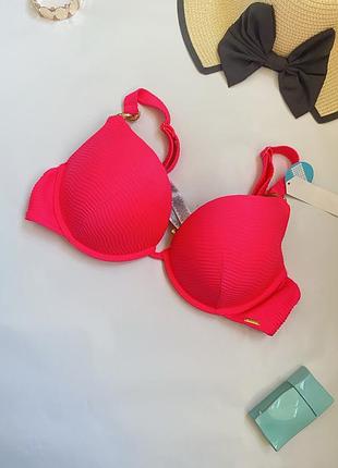 Розкішний верх купальника яскраво неонового кольору з золотистими вставками