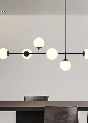 Видовжена люстра в чорному корпусі