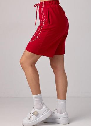Женские трикотажные шорты с вышивкой3 фото