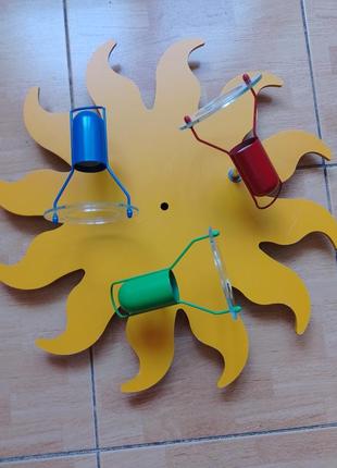 Люстра в виде солнышка для детской комнаты