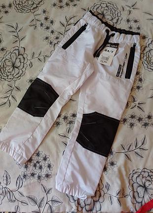 Нові спортивні штани