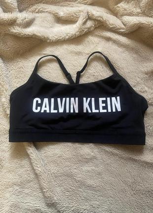 Топ спортивный 🔥🔥🔥calvin klein черный на брителях открытая спинка1 фото