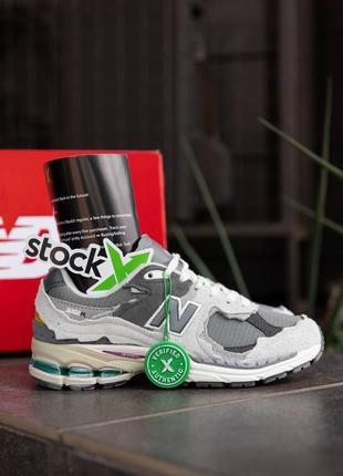 Женские кроссовки new balance 2002r protection pack rain cloud grey9 фото