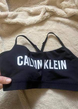 Топ спортивный 🔥🔥🔥calvin klein черный на брителях открытая спинка6 фото