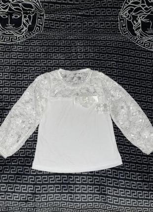 Нова біла блуза дівчинці 4-5 років1 фото