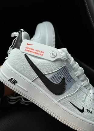 Кроссовки унисекс nike air force 1 low black/white2 фото