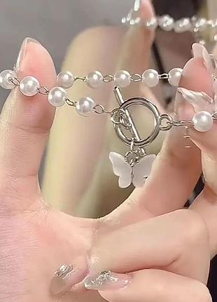 Браслет с бусинами бабочка