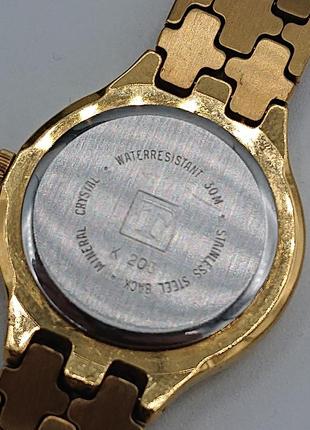 Жіночий позолочений годинник tissot k 2038 фото