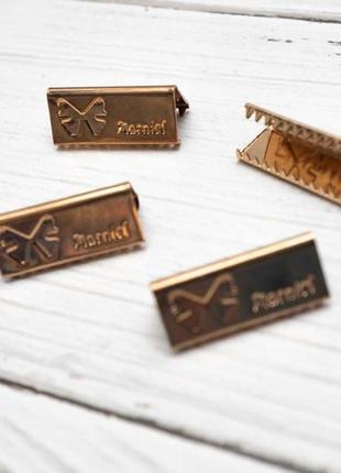 Наконечник-затискач для пояса або стрічки метал золото