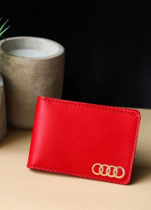 Обкладинка для автодокументів з логотипом "audi" червона з позолотою.