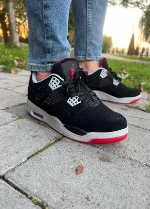 Чоловічі кросівки jordan 4 black white red2 фото