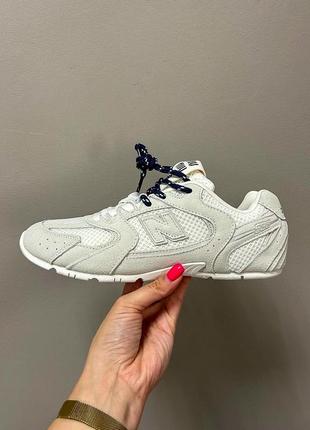 Стильные женские кроссовки miu miu x new balance 530 серо-белые