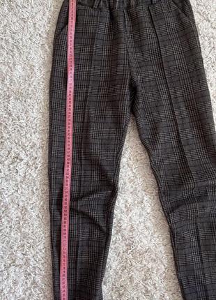 Теплые брюки в клетку темно-коричневые в клетку