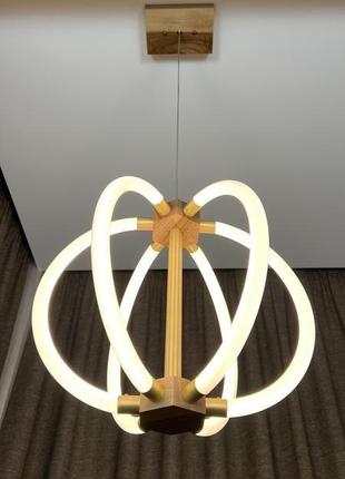 Подвесная люстра с неоновой led подсветкой для круглого обеденного стола8 фото