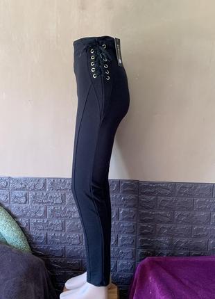 Брюки брюки новые черного цвета с замочком сзади размер xs s1 фото