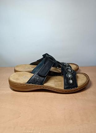 Шльопанці rieker