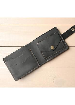 Невеликий гаманець з натуральної шкіри чорного кольору