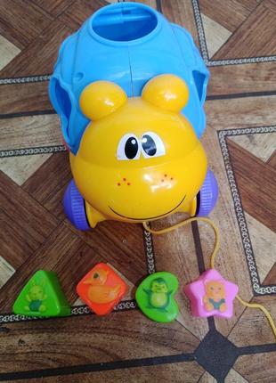 Сортер. каталка. игрушка на веревке