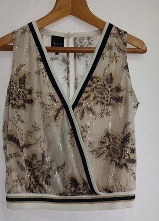 Оригинальная блуза на запах, расшитая пайетками