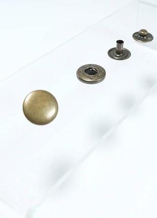 Кнопка альфа 15мм 15шт. золото (520)