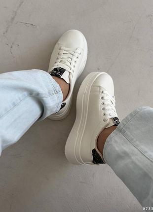 Кросівки на платформі з тваринним принтом