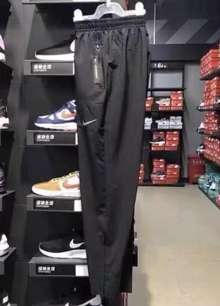 Спортивні штани nike essential woven cone running long  black aa1998-010