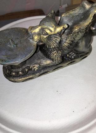 Подсвечник грифон