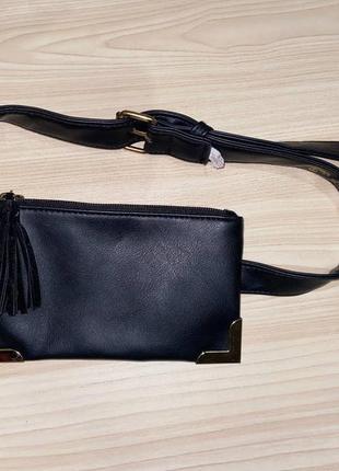 Поясная сумка с кисточками atmosphere