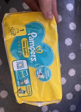 Нові підгузки pampers premium protection 12 фото