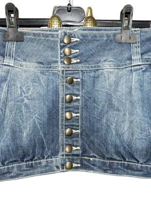 Жіноча джинсова міні спідниця з гудзиками1 фото