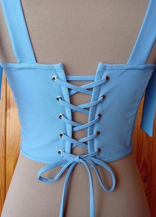 Корсет блакитного кольору