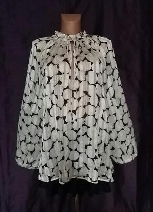 Ошатна блуза вільного крою бежевого і чорного кольору. принт мушлі.комбінований шифон.