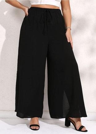 Легенькі штани палацоцо з розрізами по боках2 фото