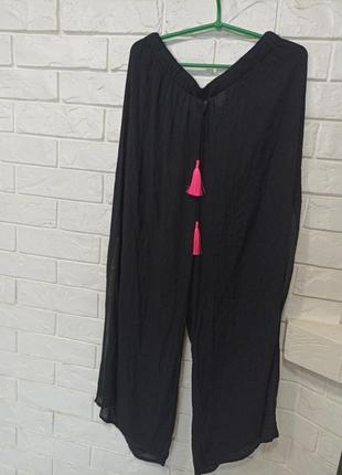 Легенькі штани палацоцо з розрізами по боках6 фото