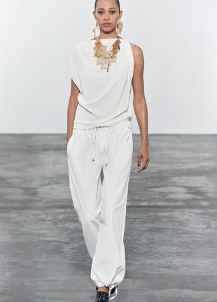 Асимметричный топ с домотканым эффектом