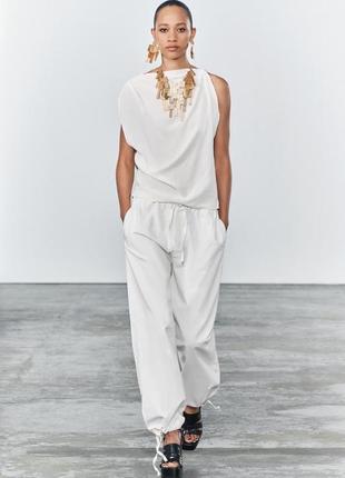 Асимметричный топ с домотканым эффектом