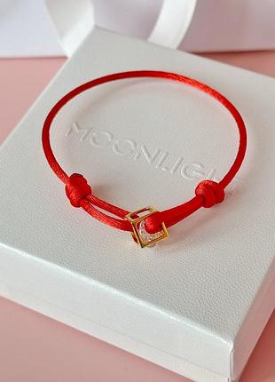 Браслет на шовковій нитці