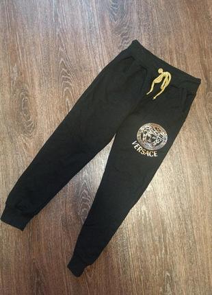 Штани versace