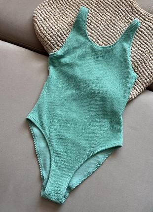 Зеленый бирюзовый рельефный цельный купальник ткань кукуруза