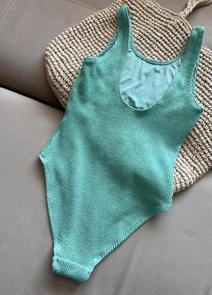 Зеленый бирюзовый рельефный цельный купальник ткань кукуруза